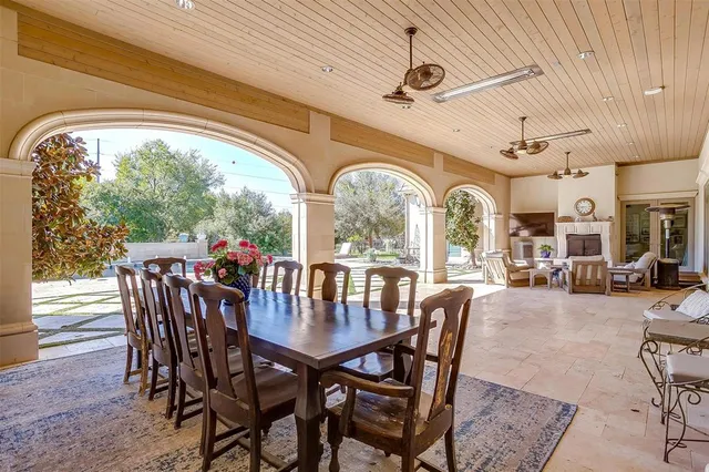 swimming pool view with a outdoor seating