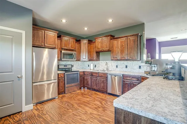 a room with table tennis pool table and chairs