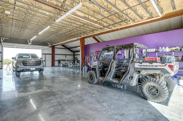 a dining room with furniture a rug and wooden floor