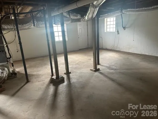 a view of a livingroom with wooden floor
