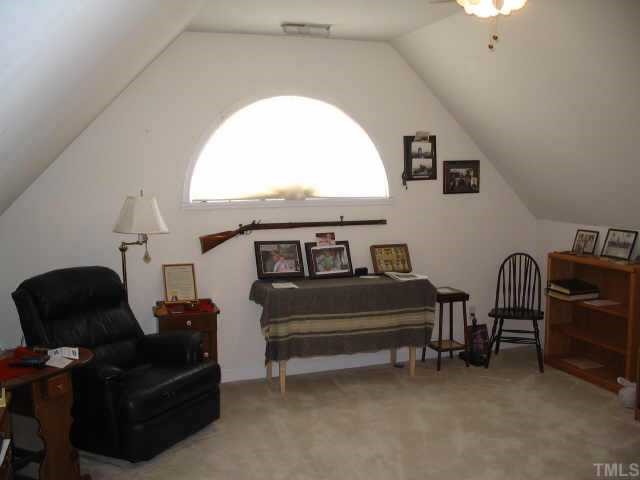 8633 Harps Mill Road Raleigh, NC 27615 - Photo 9 of 10 a living room with furniture