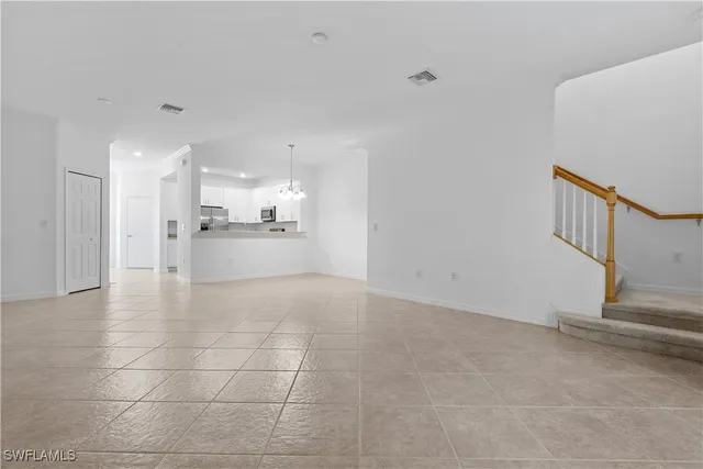 a view of a kitchen with a sink