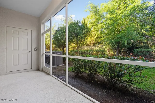 a view of balcony with yard