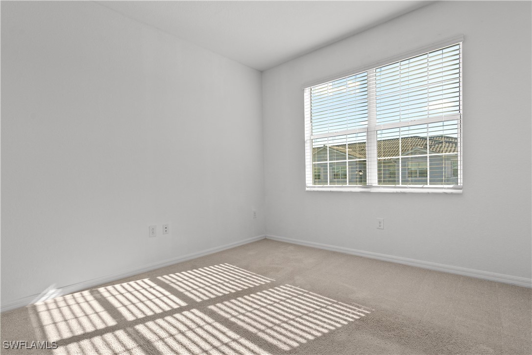 12568 Westhaven Way Fort Myers, FL 33913 - Photo 25 of 26 an empty room with a window