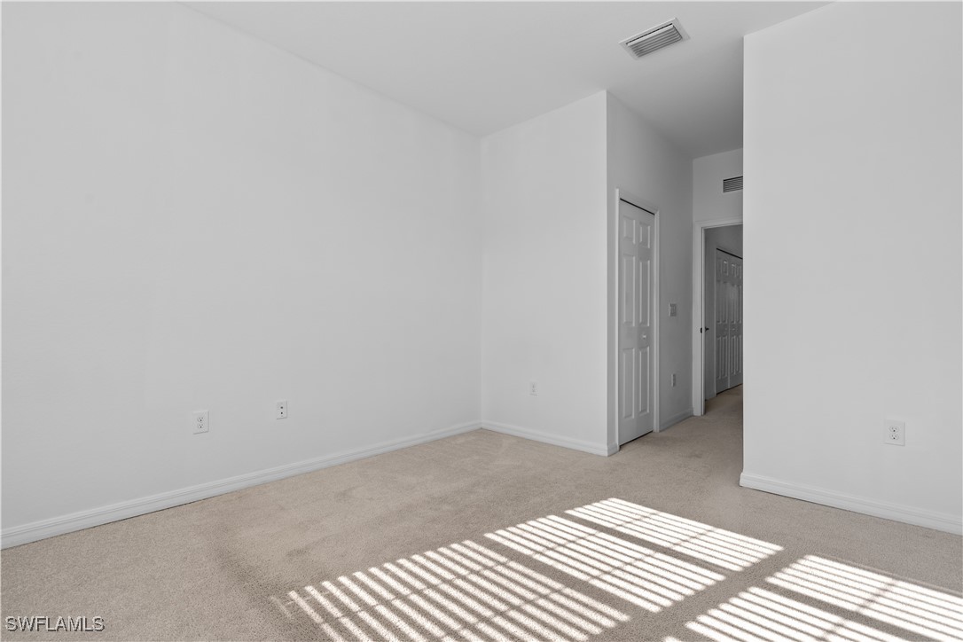 12568 Westhaven Way Fort Myers, FL 33913 - Photo 26 of 26 a view of a room with wooden floor and a bathroom