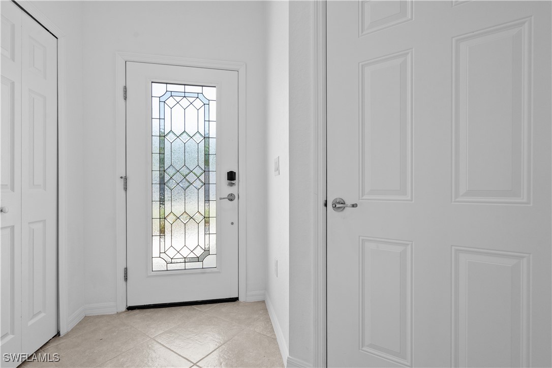 12568 Westhaven Way Fort Myers, FL 33913 - Photo 3 of 26 a view of an entryway with white walls