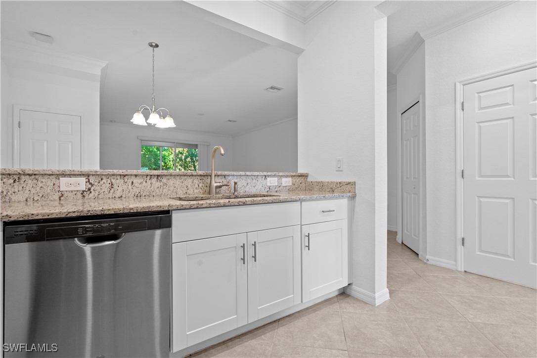 12568 Westhaven Way Fort Myers, FL 33913 - Photo 7 of 26 a sink with granite countertop a sink and cabinets
