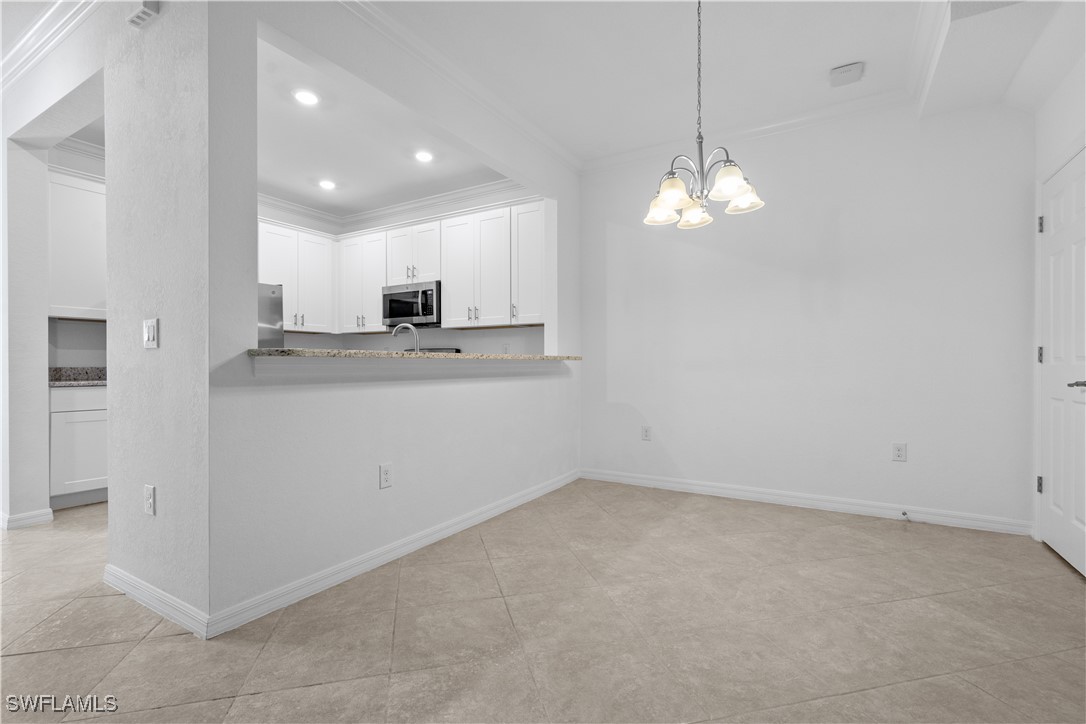 12568 Westhaven Way Fort Myers, FL 33913 - Photo 10 of 26 a view of a kitchen with electric appliances