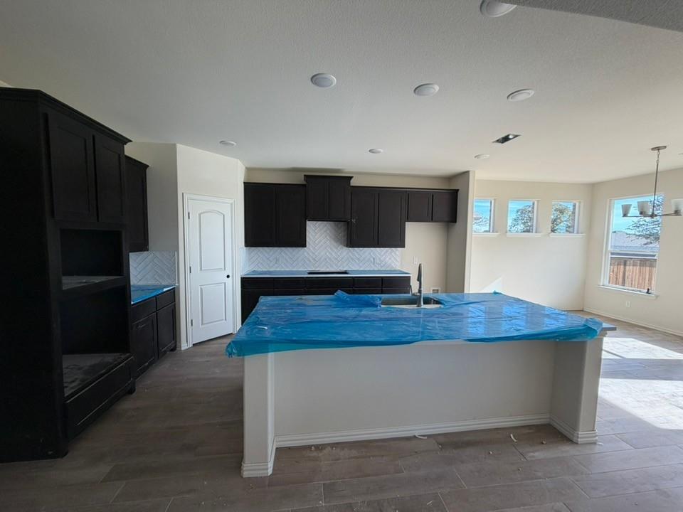 1116 Trinity Drive Springtown, TX 76082 - Photo 11 of 11 a room with a furniture and a window