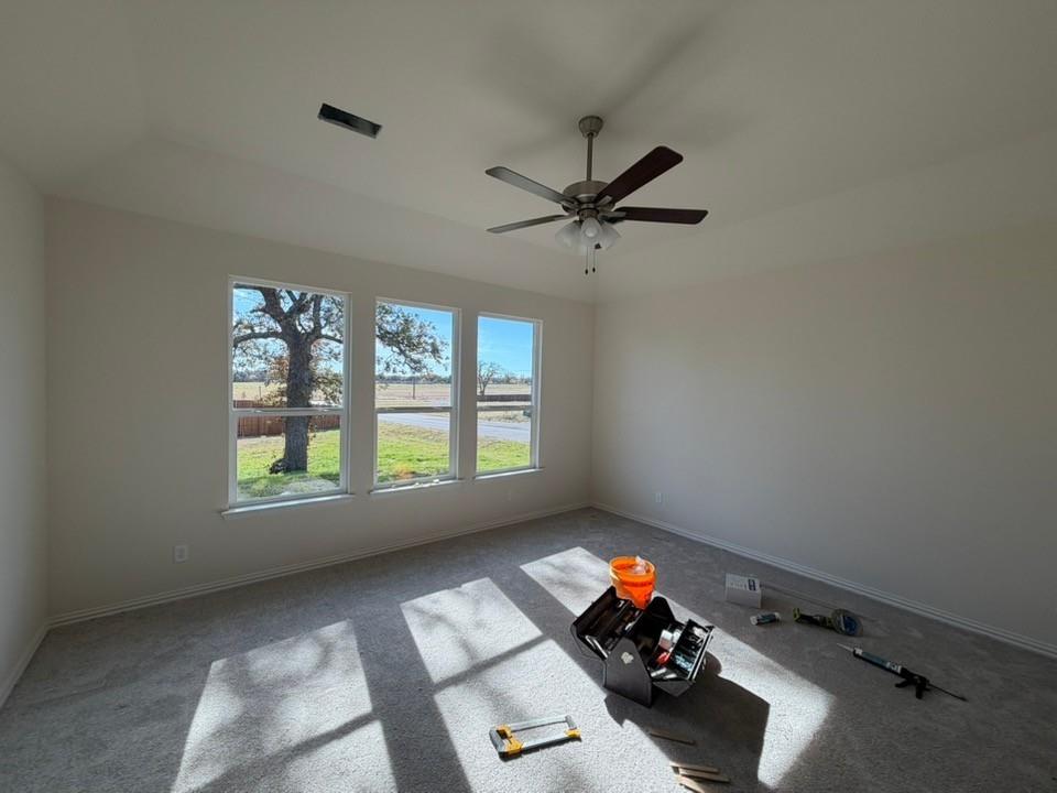 1116 Trinity Drive Springtown, TX 76082 - Photo 4 of 11 a living room with furniture and a window