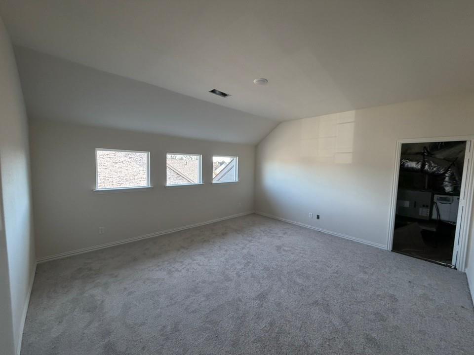 1116 Trinity Drive Springtown, TX 76082 - Photo 6 of 11 an empty room with windows