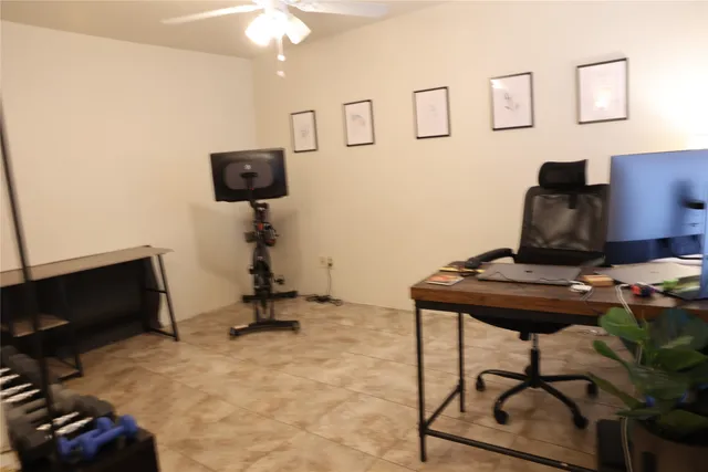 a view of a workspace with furniture