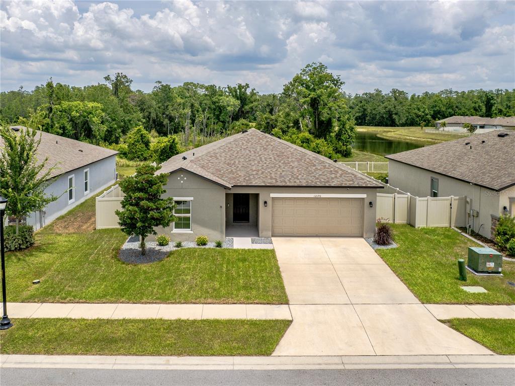 a view of backyard with green space