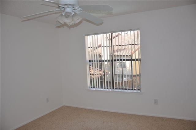 5630 Spring Valley Road, Unit 13C Dallas, TX 75254 - Photo 12 of 16 a view of an empty room with a window