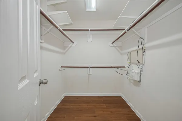 a view of a room with racks on the wall