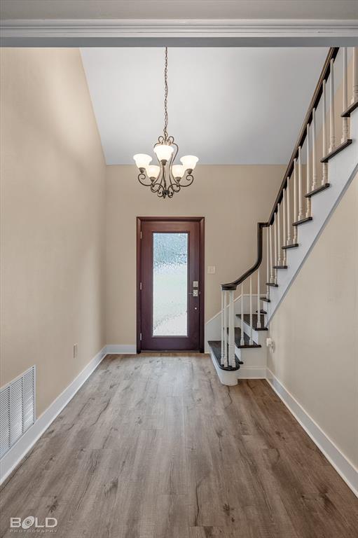 15 Lee Lane Haughton, LA 71037 - Photo 2 of 39 a view of a room with wooden floor and stairs