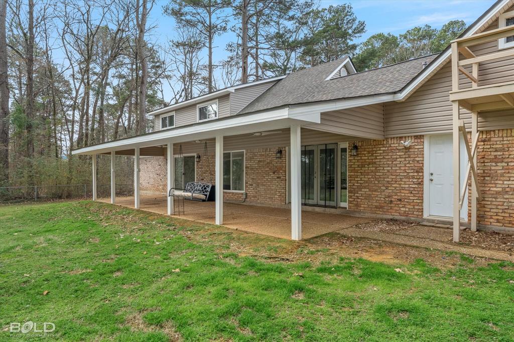 15 Lee Lane Haughton, LA 71037 - Photo 30 of 39 a view of a house with a backyard