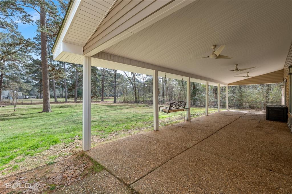 15 Lee Lane Haughton, LA 71037 - Photo 31 of 39 a view of a house with backyard and porch