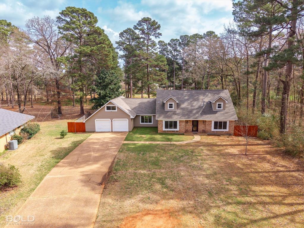 15 Lee Lane Haughton, LA 71037 - Photo 35 of 39 a front view of a house with a yard