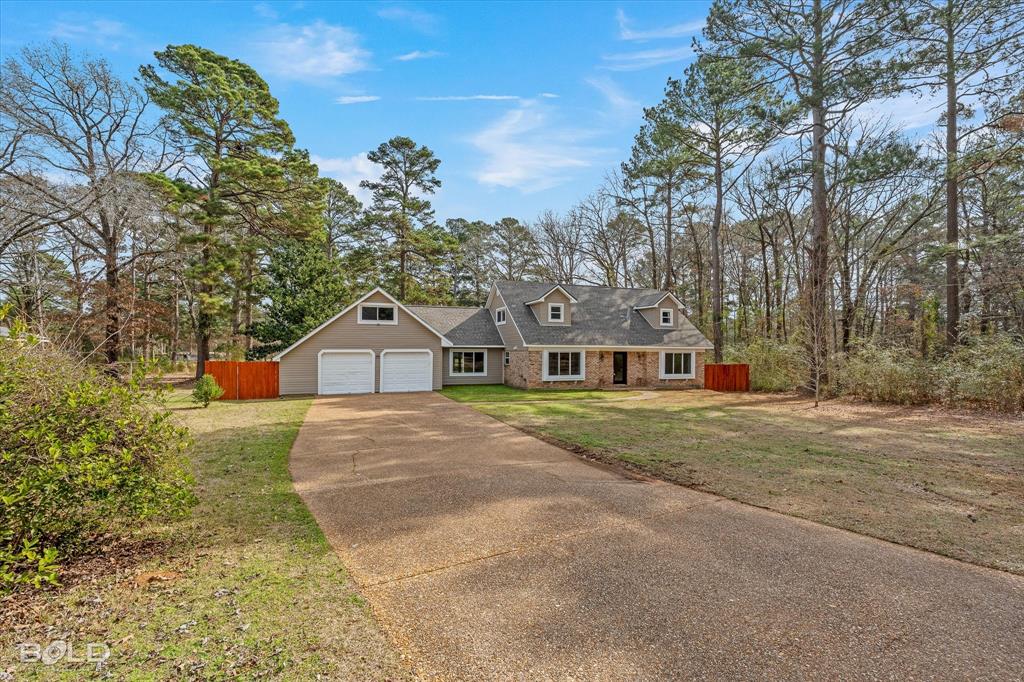 15 Lee Lane Haughton, LA 71037 - Photo 37 of 39 a front view of a house with a garden