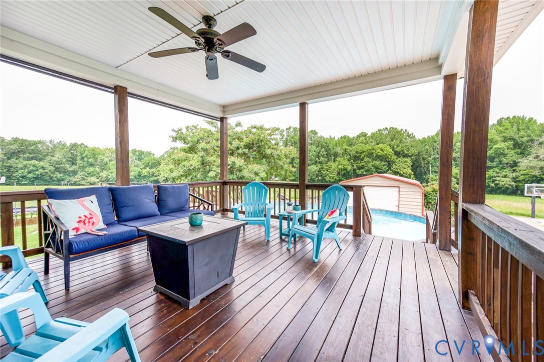 827 Sutherland Road Church Road, VA 23833 - Photo 34 of 51 Expansive covered deck featuring wood-finish floor
