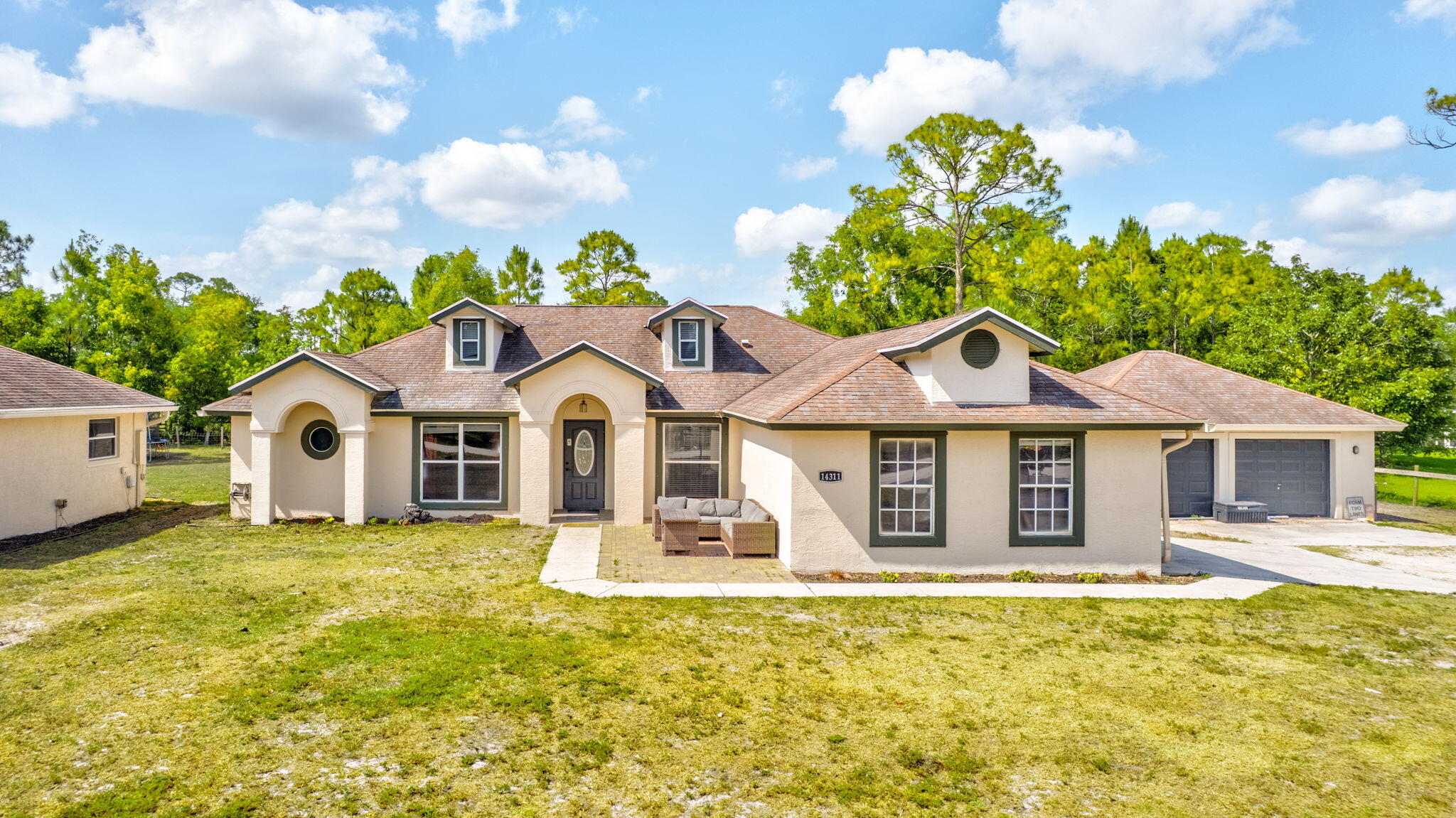 14311 86th Road North Loxahatchee, FL 33470 - Photo 2 of 56 59-web-or-mls-DJI_0713AA