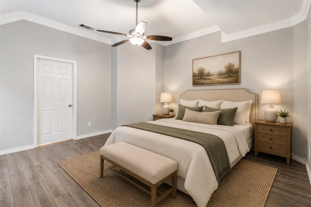 400 Moss Hill Road Irving, TX 75063 - Photo 14 of 26 Large Primary with Crown Molding on First Floor