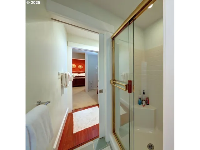 a bathroom with a sink toilet and mirror