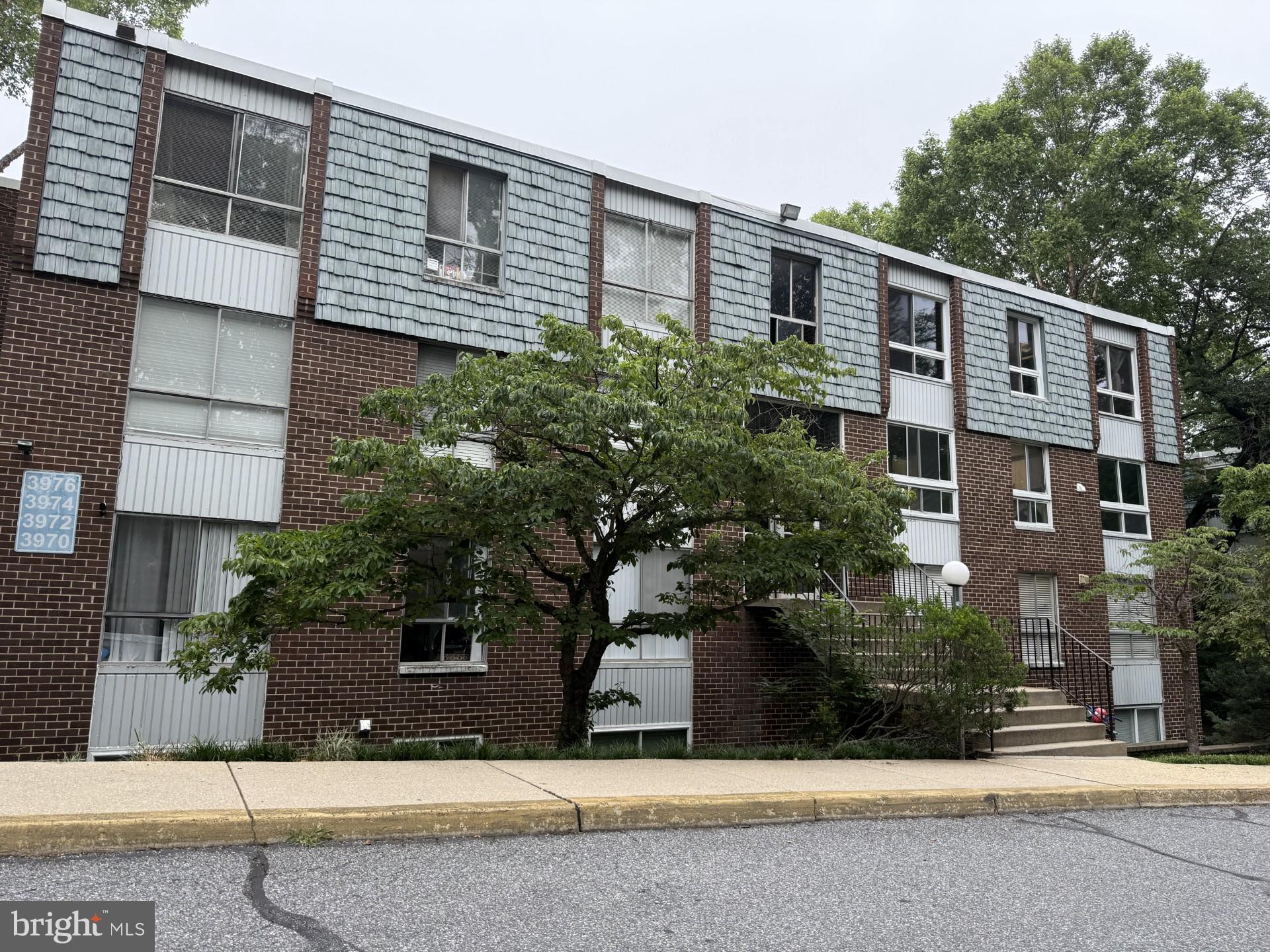 3976 Bel Pre Road, Unit 2 Silver Spring, MD 20906 - Photo 1 of 20 Front of building (unit is down 1.5 flights