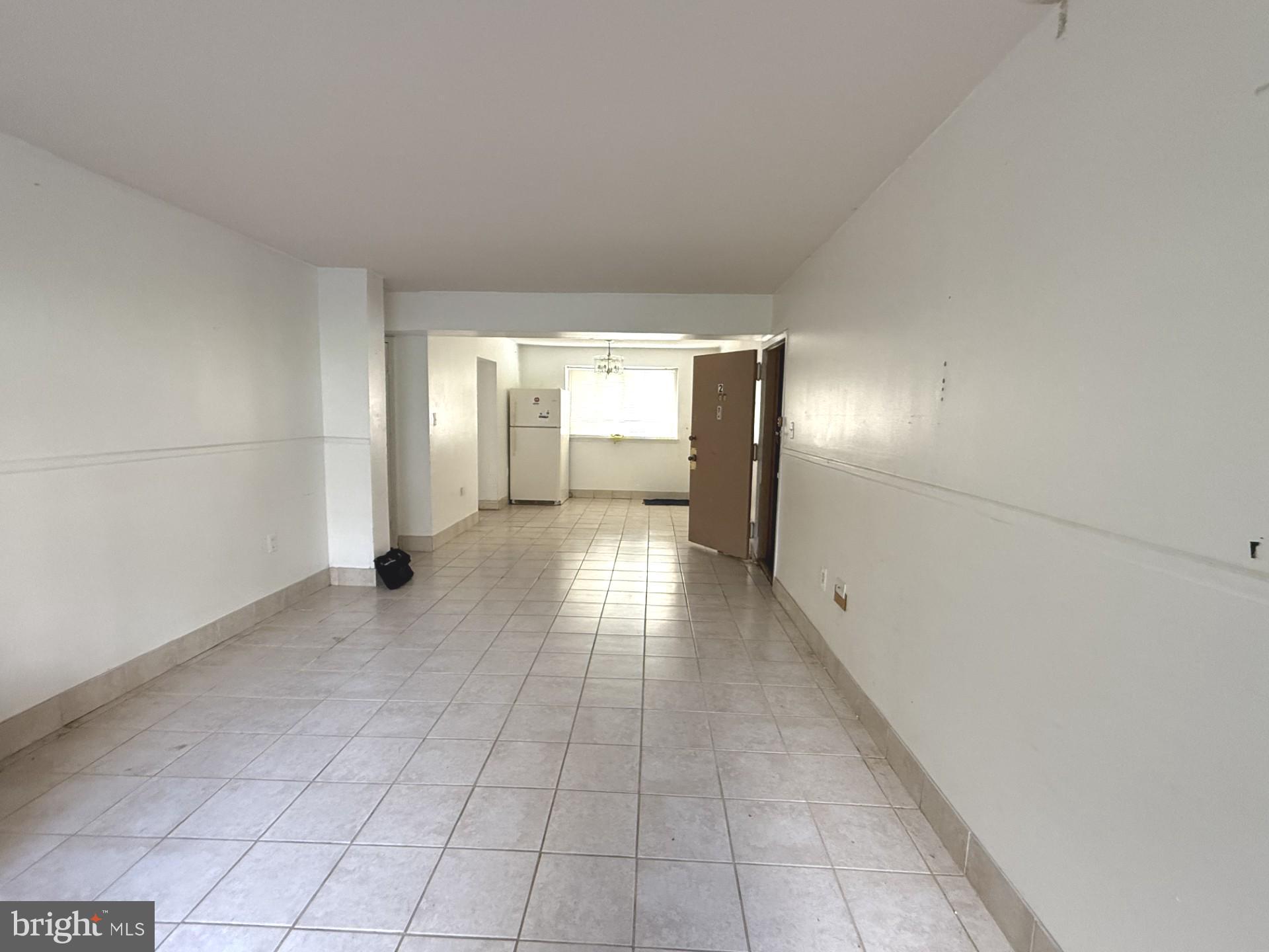 3976 Bel Pre Road, Unit 2 Silver Spring, MD 20906 - Photo 5 of 20 living room looking to dining room