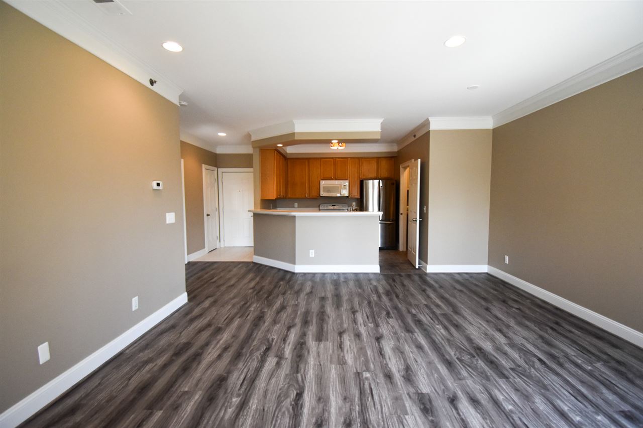 39170 Hayes Road Clinton Township, MI 48038 - Photo 4 of 23 Living room to the kitche