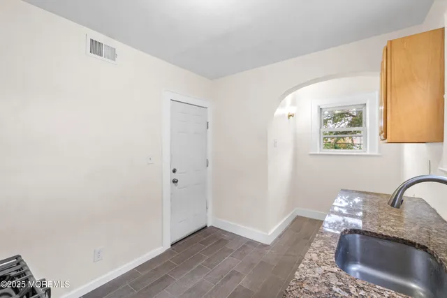 a view of a hallway with closet