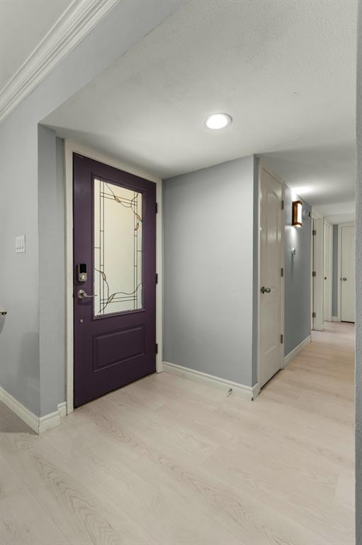 2113 Victoria Road Carrollton, TX 75007 - Photo 3 of 19 an empty room with windows and closet