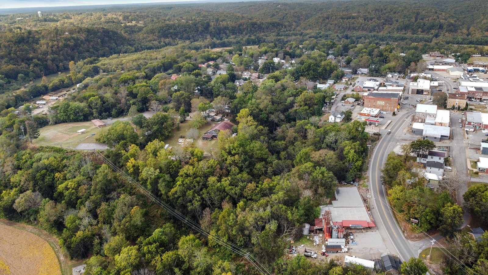 105 Webb Street Centerville, TN 37033 - Photo 13 of 35 an aerial view of residential house with outdoor space and trees