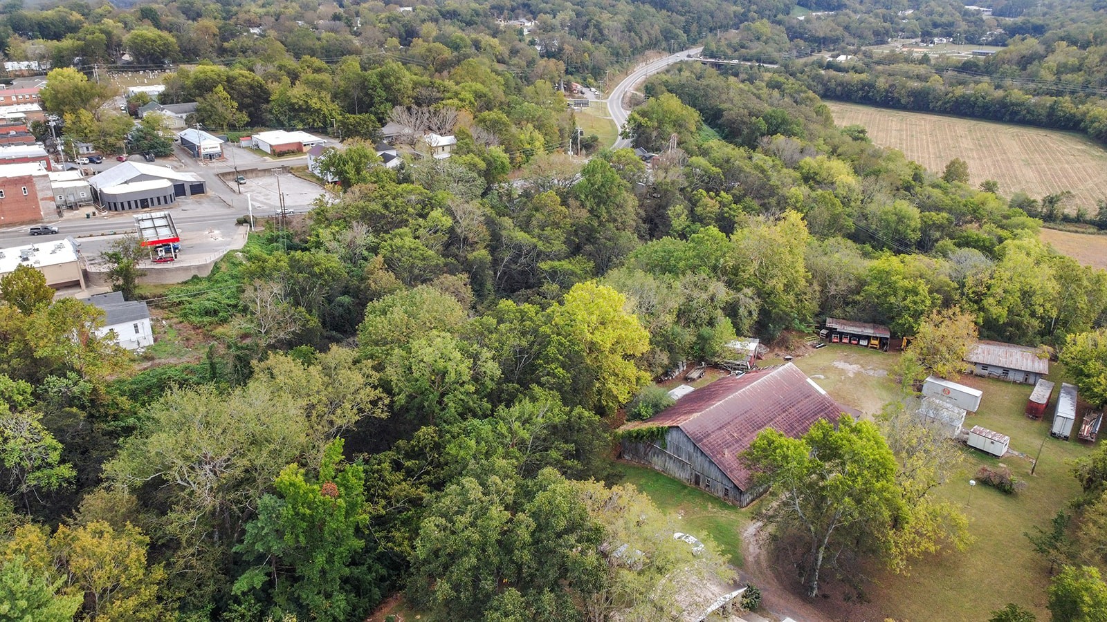 105 Webb Street Centerville, TN 37033 - Photo 17 of 35 an aerial view of residential houses with outdoor space