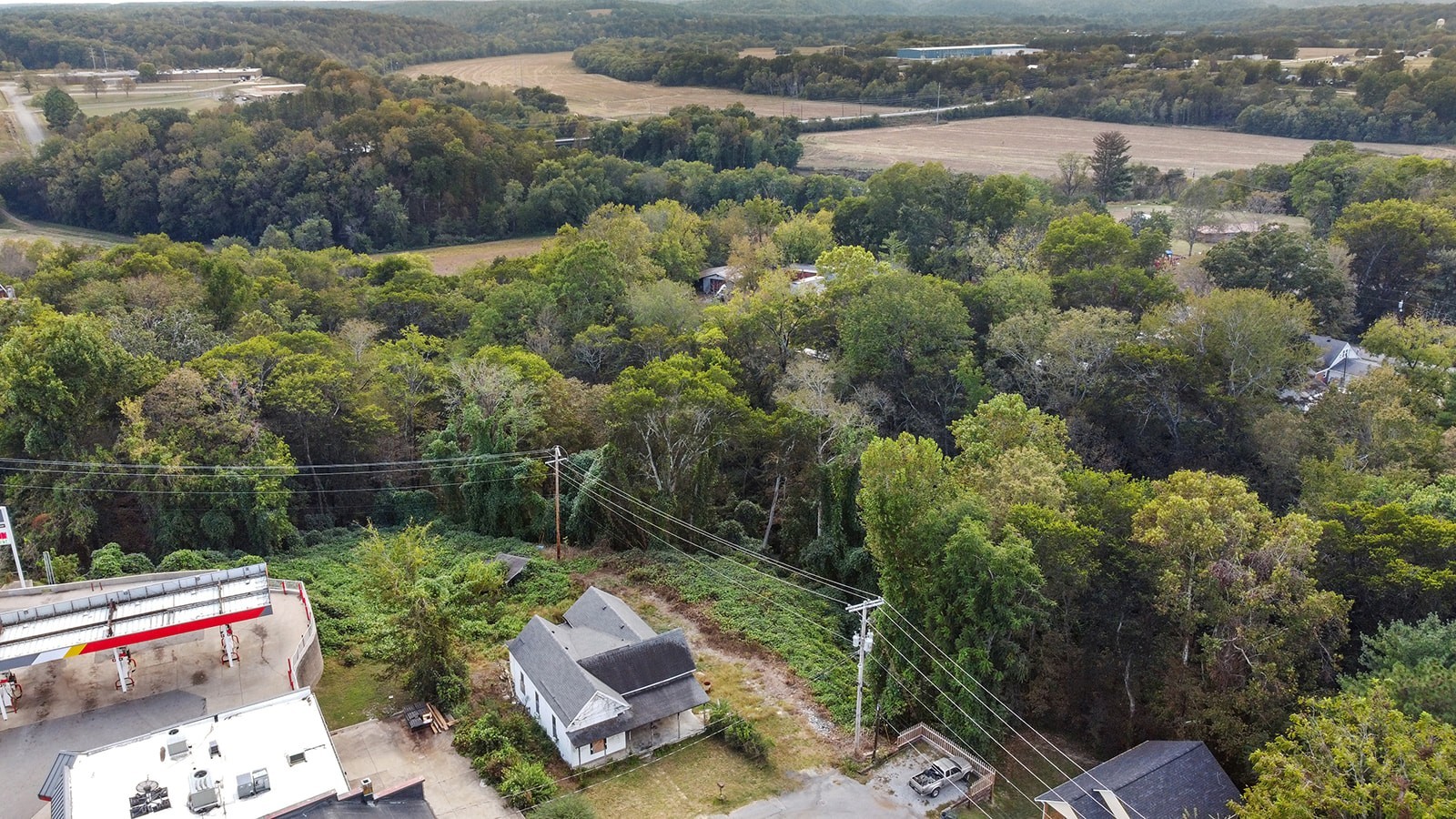 105 Webb Street Centerville, TN 37033 - Photo 2 of 35 a backyard of a house with a yard and outdoor seating