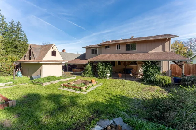 a house view with a garden space