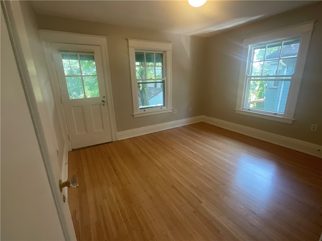 923 Harvard Street Rochester, NY 14610 - Photo 22 of 45 The master bedroom has access to the upstairs back porch.