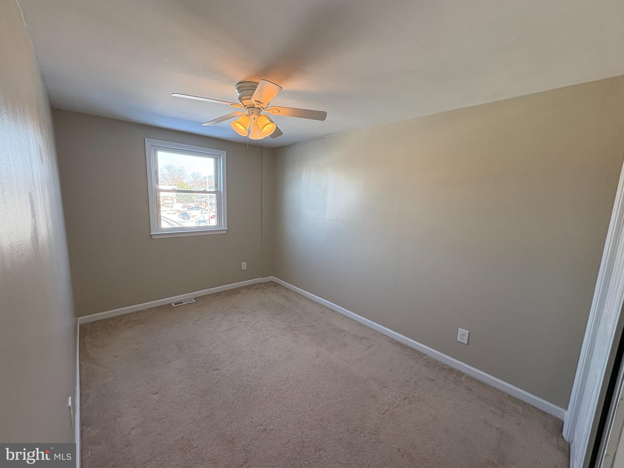 3251 Morning Glory Road Philadelphia, PA 19154 - Photo 12 of 19 an empty room with windows and fan