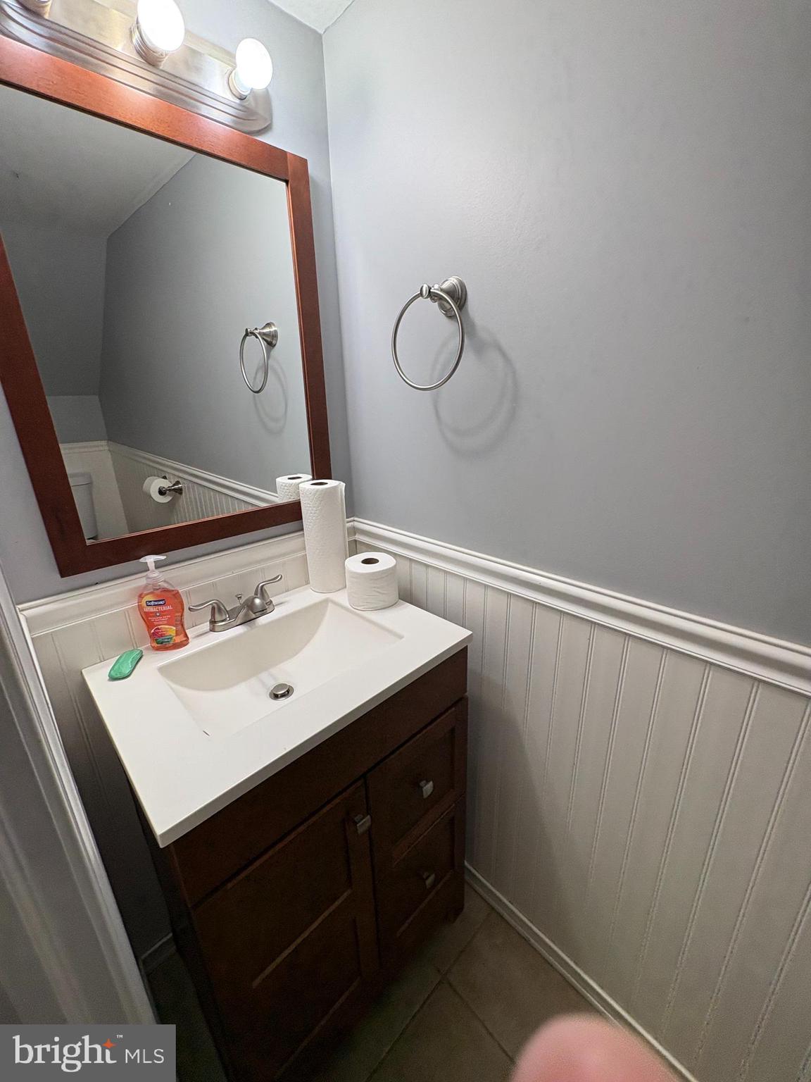 3251 Morning Glory Road Philadelphia, PA 19154 - Photo 16 of 19 a bathroom with a sink vanity and mirror