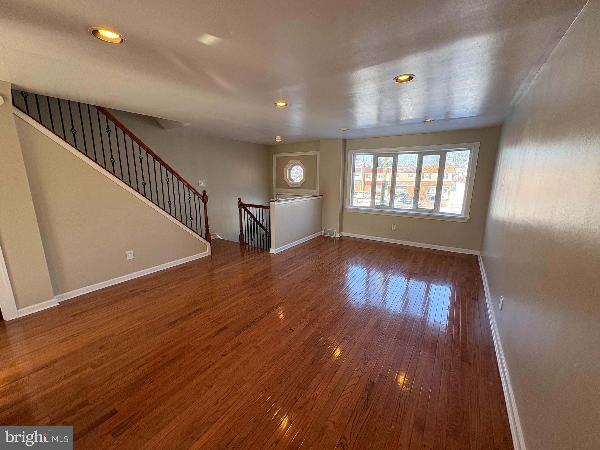 3251 Morning Glory Road Philadelphia, PA 19154 - Photo 2 of 19 wooden floor with a window in a hall with an entryway