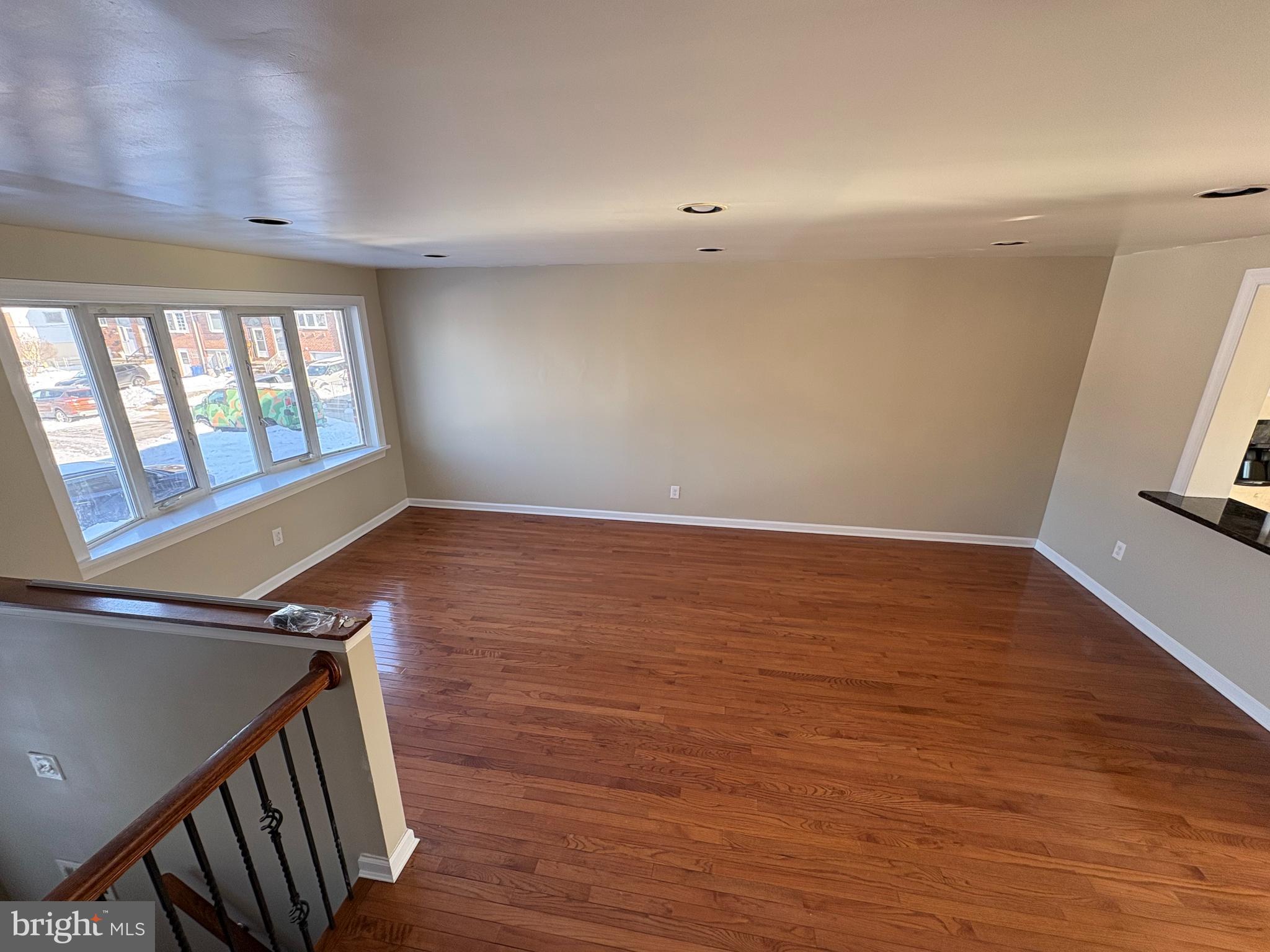 3251 Morning Glory Road Philadelphia, PA 19154 - Photo 4 of 19 wooden floor in an empty room with a window