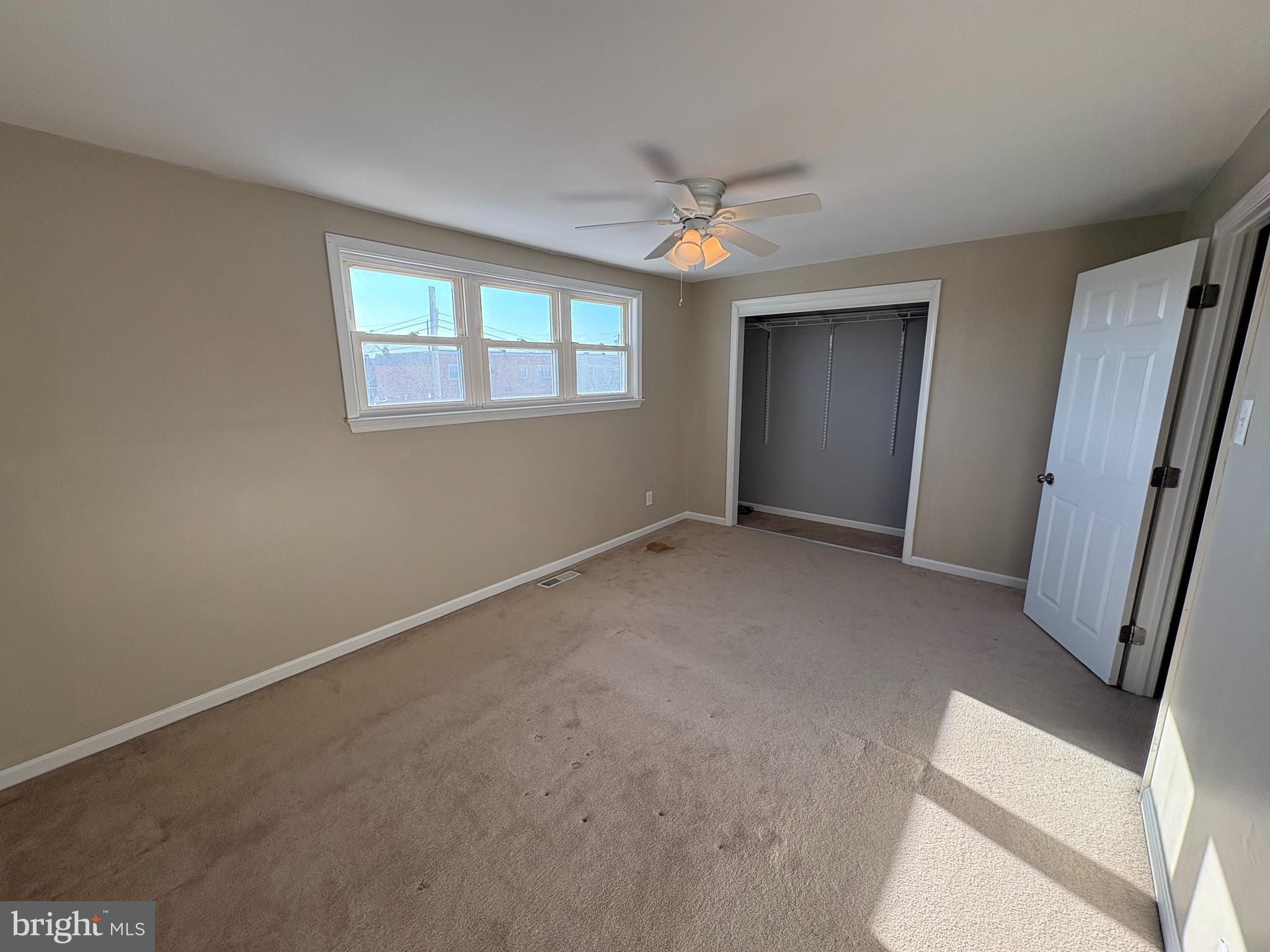 3251 Morning Glory Road Philadelphia, PA 19154 - Photo 8 of 19 an empty room with windows and entrance