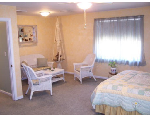 2001 Greenwich Road Hardwick, MA 01082 - Photo 17 of 27 a room with a bed and a chair