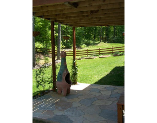 2001 Greenwich Road Hardwick, MA 01082 - Photo 2 of 27 a view of a yard with plants and a bench