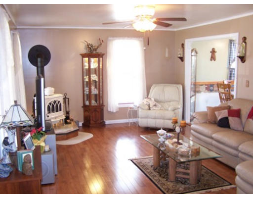 2001 Greenwich Road Hardwick, MA 01082 - Photo 9 of 27 a living room with furniture and a wooden floor