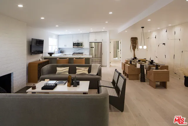a bathroom with a sink double vanity and mirror