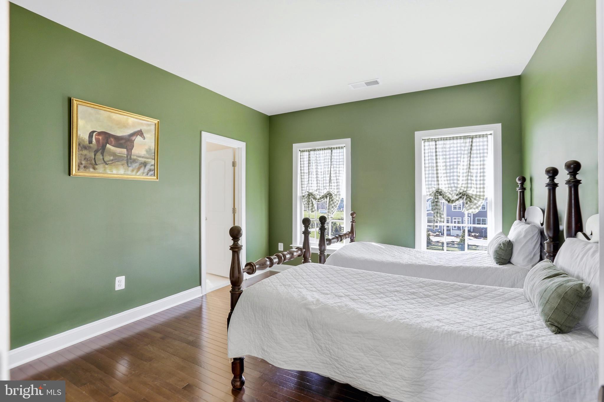 36972 Bridle Ridge Lane Purcellville, VA 20132 - Photo 33 of 44 a bedroom with a bed and a large window