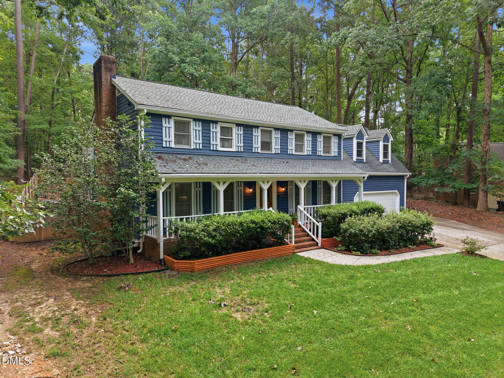 4913 Springwood Drive Raleigh, NC 27613 - Photo 2 of 54 2-web-or-mls-DJI_20260805102434_0439_D