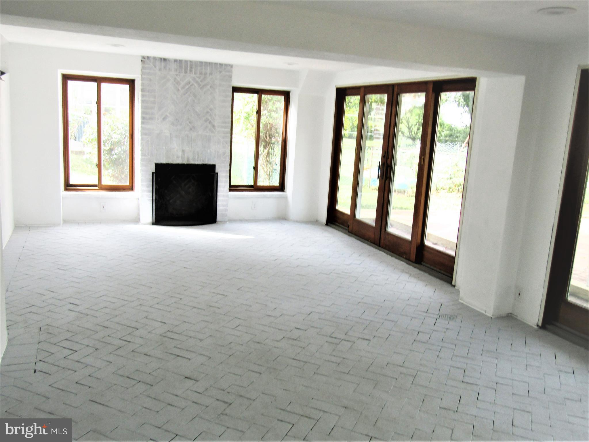 566 Forest View Road Linthicum Heights, MD 21090 - Photo 12 of 51 4 seasons room- separate heating and AC